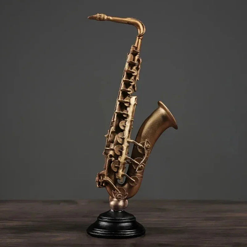 Ornamento Decorativo de Resina Violino e Saxofone Dourado Lenogue