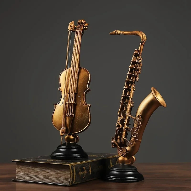 Ornamento Decorativo de Resina Violino e Saxofone Dourado Lenogue